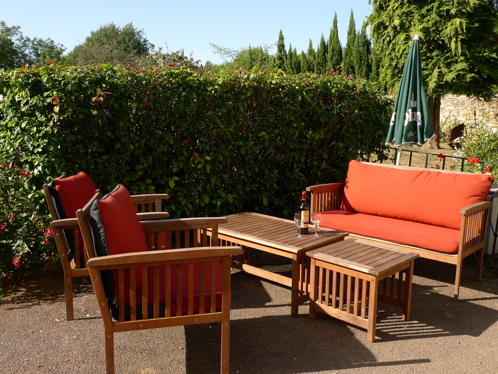 Relax on the Patio at Gite Tranquille